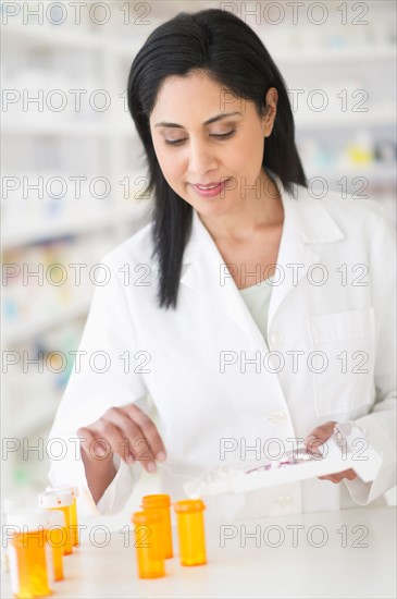 Pharmacist preparing medicines.