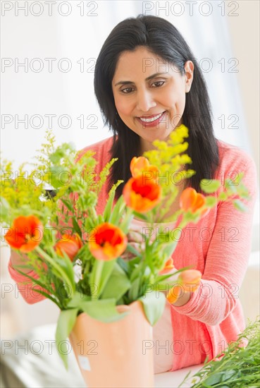 Woman receiving bouquet.