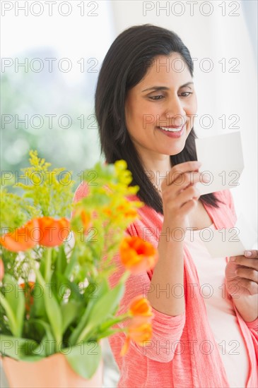 Woman reading note.