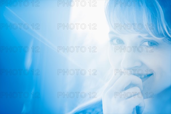 Woman in blue light.