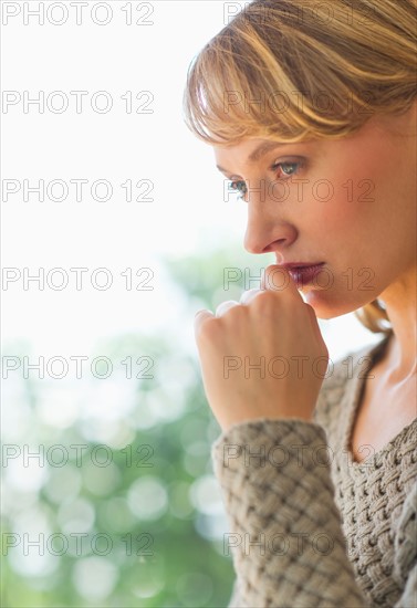 Portrait of woman contemplating.