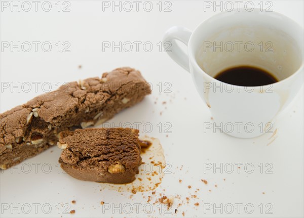 Close up of chocolate cake and cup of coffee, studio shot. Photo : Jamie Grill