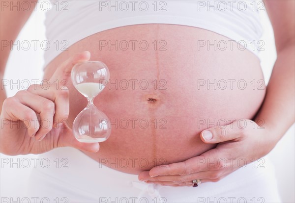 Pregnant woman with ultrasonography scan. Photo : Daniel Grill