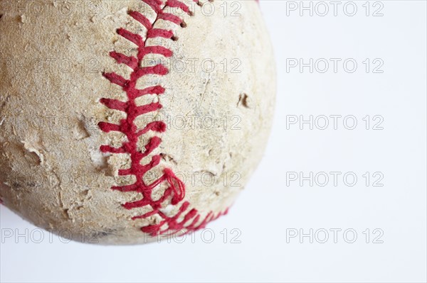 Studio shot of old baseball ball. Photo : Winslow Productions