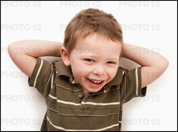 Portrait of happy boy (4-5). Photo : Mike Kemp