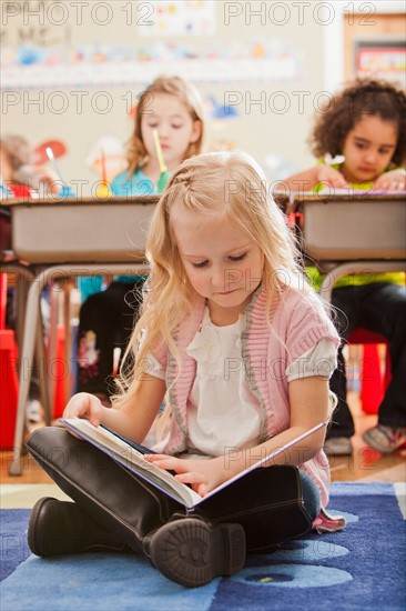 Children (2-3, 4-5, 6-7) at school. Photo : Mike Kemp