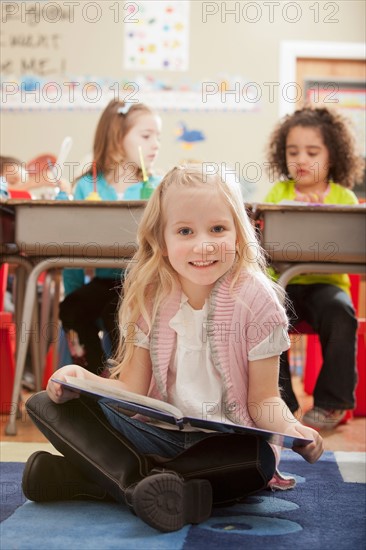Children (2-3, 4-5, 6-7) at school. Photo : Mike Kemp