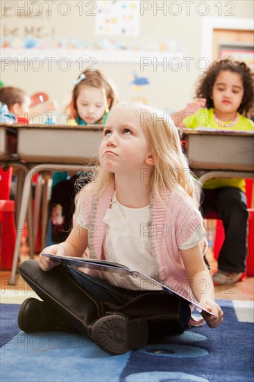 Children (2-3, 4-5, 6-7) at school. Photo : Mike Kemp