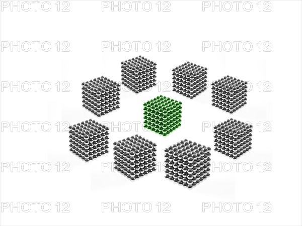 Studio shot of Pachinko balls arranged in group of cubes. Photo : David Arky