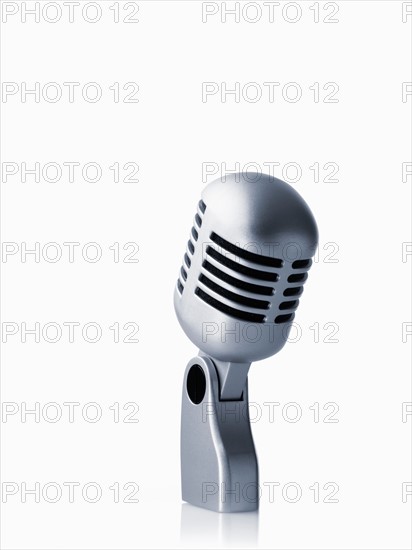 Studio shot of vintage-themed modern microphone on white background. Photo : David Arky