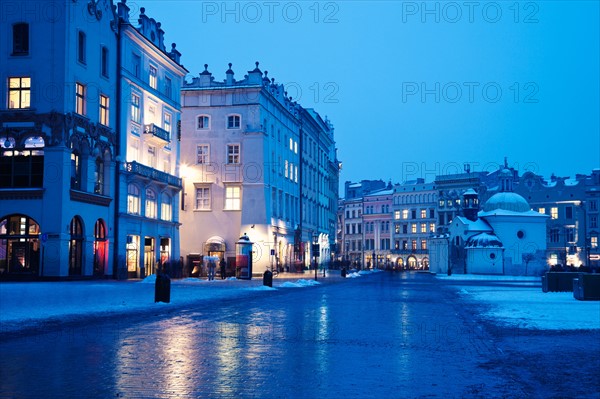 Poland, Krakow. Historic houses in main Square. Photo : Henryk Sadura