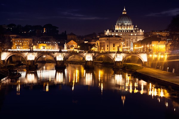 Italy, Rome. View over Tiber River towards Vatican at twilight. Photo : Henryk Sadura