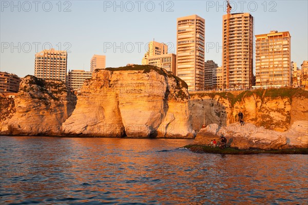 Lebanon, Beirut. Pigeon Rock and Beirut architecture at sunset. Photo : Henryk Sadura