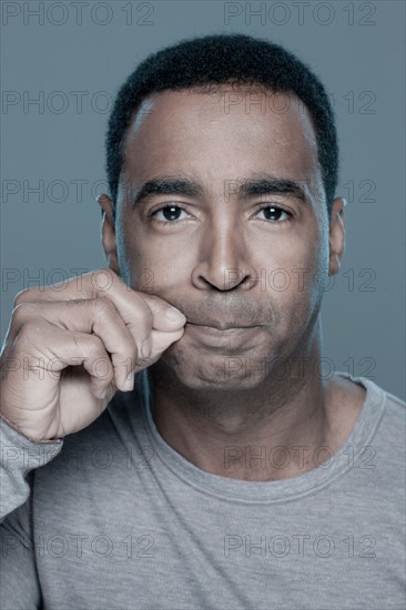 studio shot of mature man. Photo : Rob Lewine