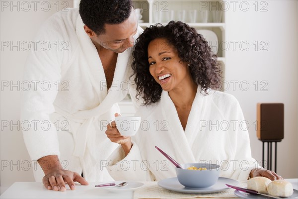 Mid adult couple at breakfast. Photo : Rob Lewine