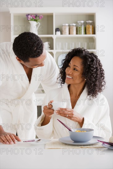 Mid adult couple at breakfast. Photo : Rob Lewine