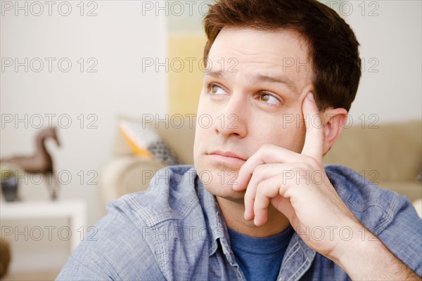 Portrait of thoughtful mid adult man. Photo : Rob Lewine