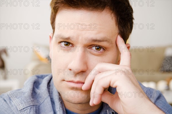 Portrait of thoughtful mid adult man. Photo : Rob Lewine