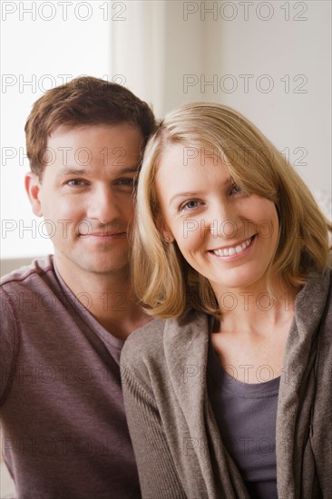 Portrait of smiling mid adult couple. Photo : Rob Lewine