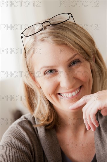 Portrait of smiling mid adult woman. Photo : Rob Lewine