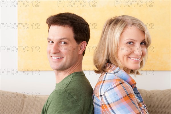 Portrait of smiling mid adult couple. Photo : Rob Lewine