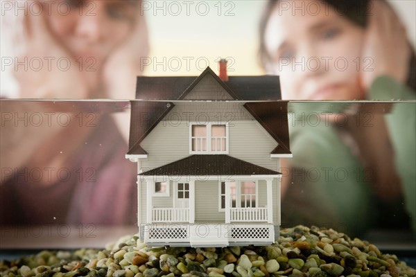 Toy house in water. Photo : Rob Lewine