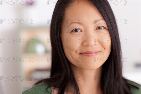 Portrait of mature woman smiling. Photo : Rob Lewine