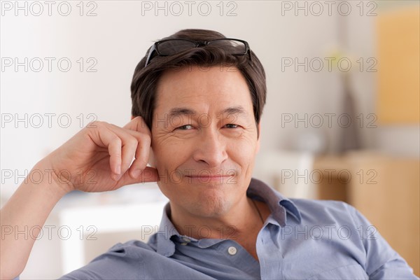 Portrait of man smiling. Photo : Rob Lewine