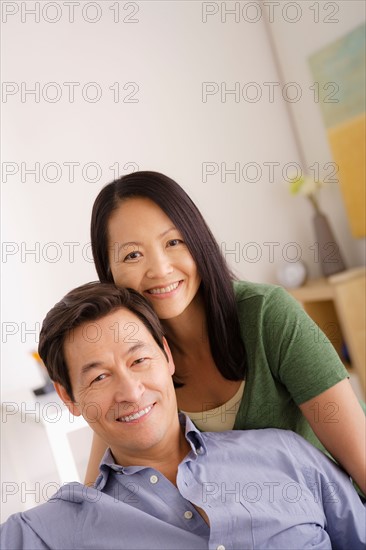 Portrait of couple smiling. Photo : Rob Lewine