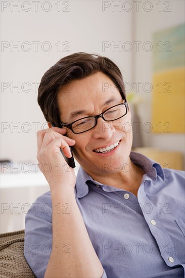 Man talking on phone. Photo : Rob Lewine