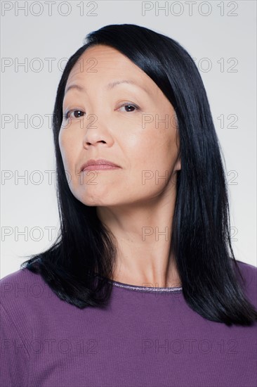 Studio portrait of mature woman. Photo : Rob Lewine