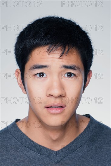 Studio portrait of young man. Photo : Rob Lewine