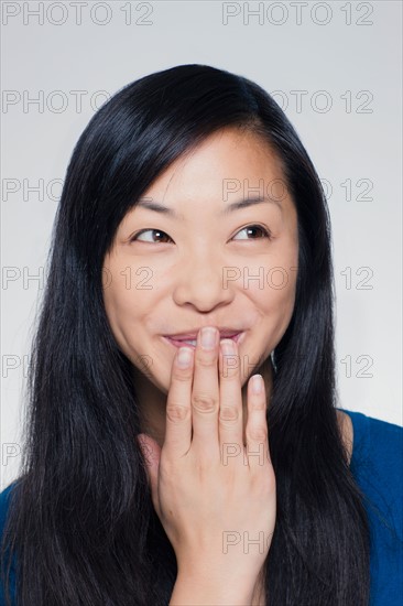 Studio portrait of young woman. Photo : Rob Lewine