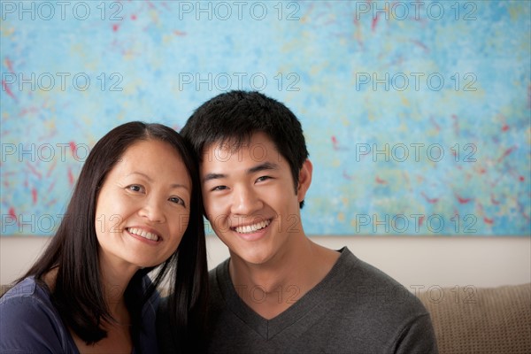 Mother with adult son posing together. Photo : Rob Lewine