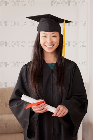 Portrait of graduated young woman. Photo : Rob Lewine