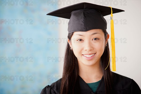 Portrait of graduated young woman. Photo : Rob Lewine
