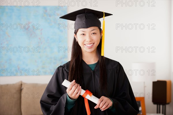 Portrait of graduated young woman. Photo : Rob Lewine