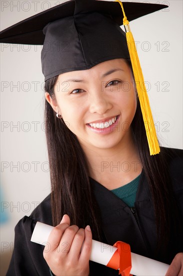 Portrait of graduated young woman. Photo : Rob Lewine