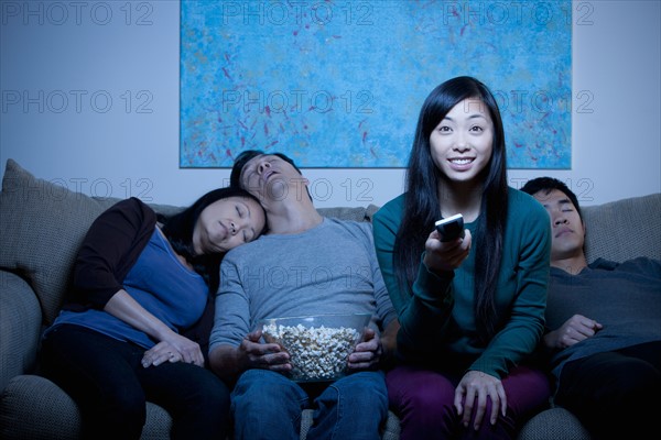 Family watching TV . Photo : Rob Lewine