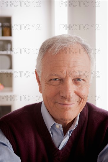 Portrait of smiling senior man. Photo : Rob Lewine