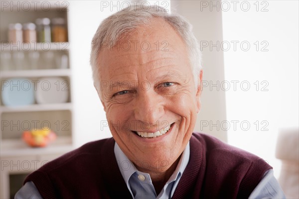 Portrait of smiling senior man. Photo : Rob Lewine