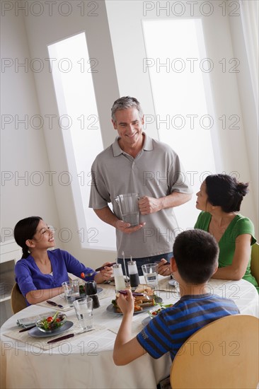 Family having breakfast together. Photo : Rob Lewine