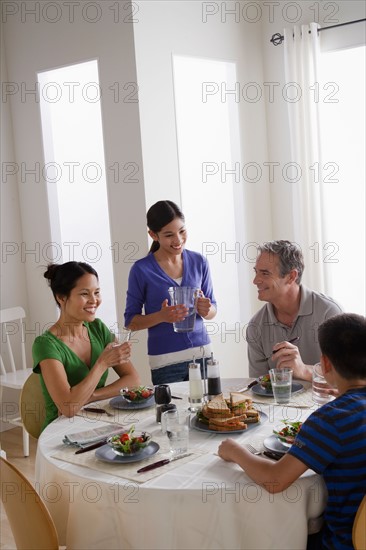 Family having breakfast together. Photo : Rob Lewine