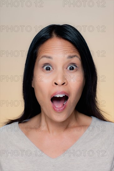 Portrait of woman with astonished expression. Photo : Rob Lewine