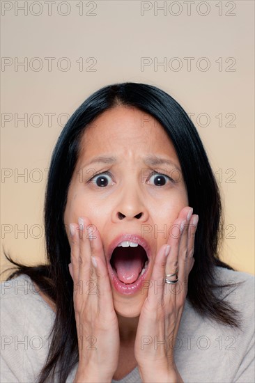 Portrait of woman with astonished expression. Photo : Rob Lewine