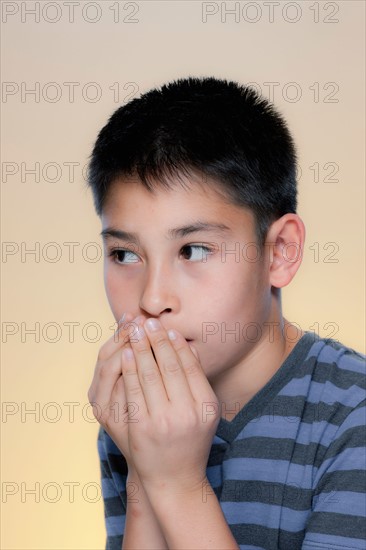 Portrait of scared boy. Photo : Rob Lewine