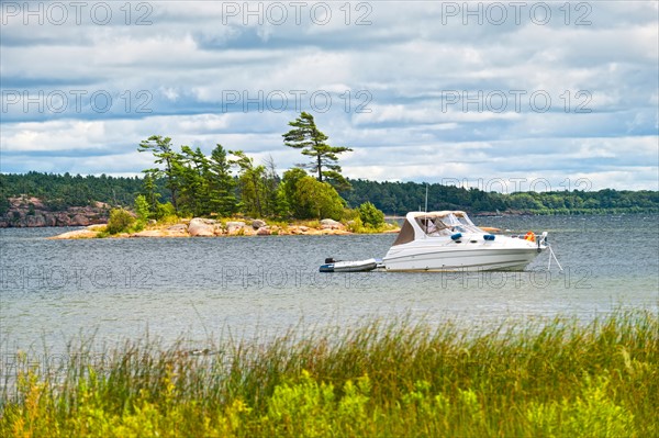 USA, Ontario, Georgian Bay. Recreational boat on water. Photo : Elena Elisseeva