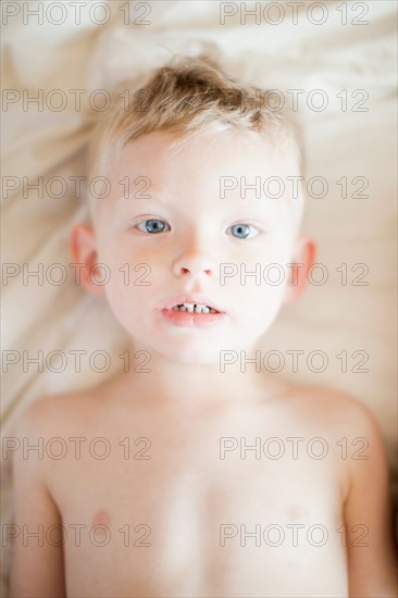 Studio portrait of shitless toddler boy (2-3). Photo : Jessica Peterson