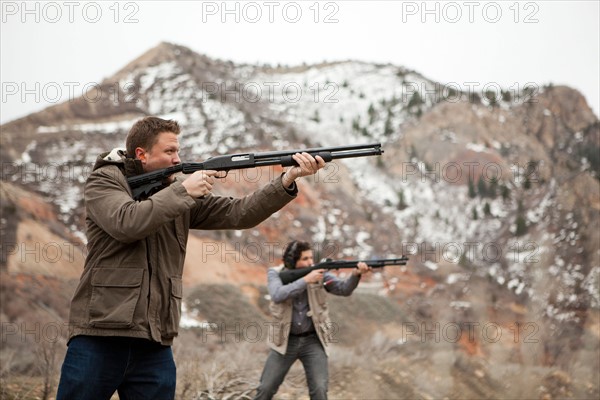 USA, Utah, Spanish Fork. Men in mountains shooting. Photo : Jessica Peterson