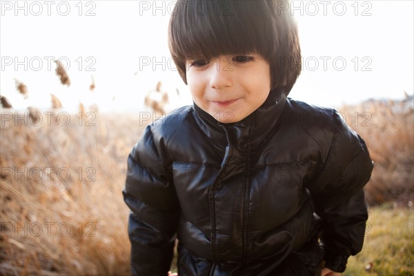 Close-up of walking boy (4-5). Photo : Jessica Peterson